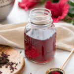 Hibiscus Syrup: 5-Min Recipe for Incredible Flavor Boost 14 Homemade hibiscus syrup in a glass jar