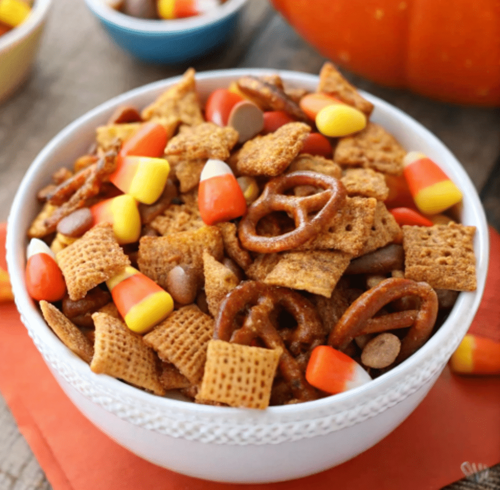 Pumpkin Spice Snack Mix packaged in mason jars for gifting